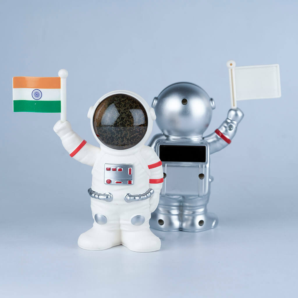 Solar Powered Astronaut Flag Figurine