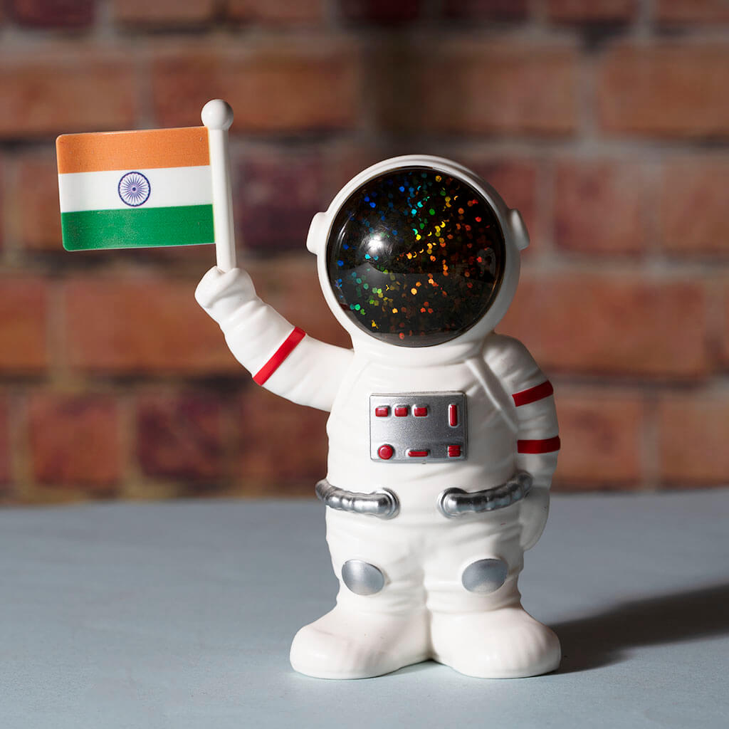 Solar Powered Astronaut Flag Figurine